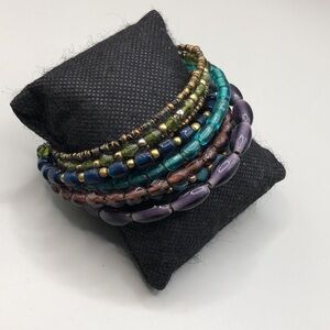 Retro artisan boho colorful glass bead memory coil statement bracelet layered.